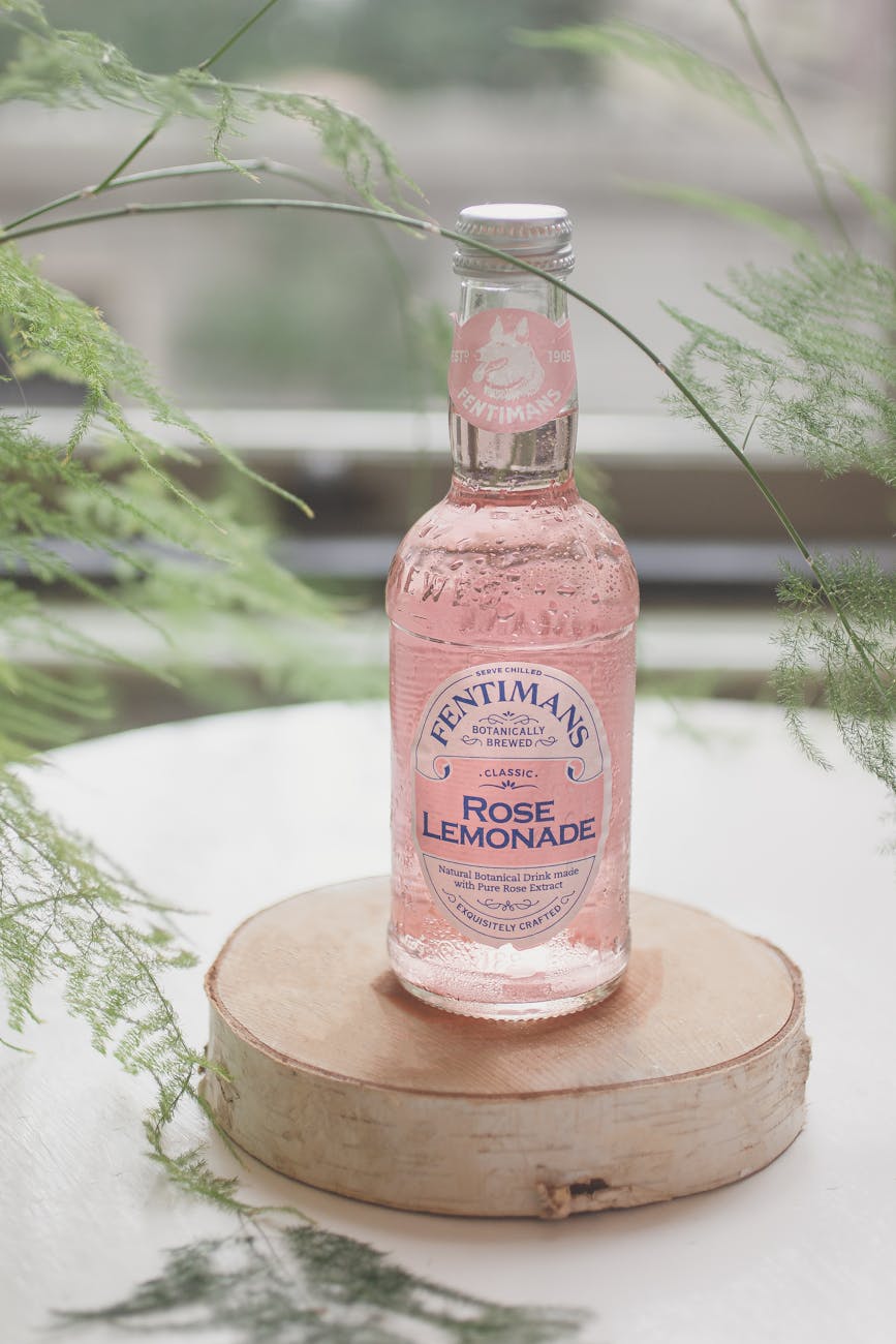 rose lemonade on a glass bottle