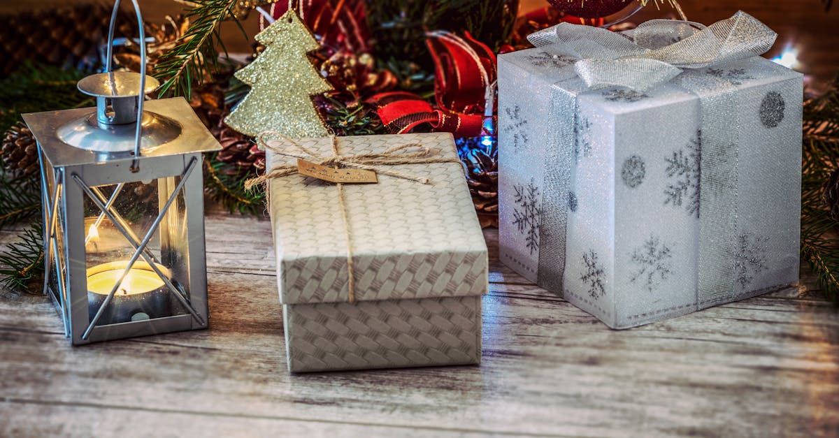 Festive Christmas scene with wrapped gifts, lantern, and holiday decorations.