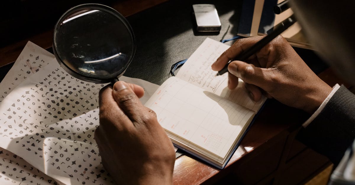 A detective decoding cipher documents with a magnifying glass, notebook in hand.